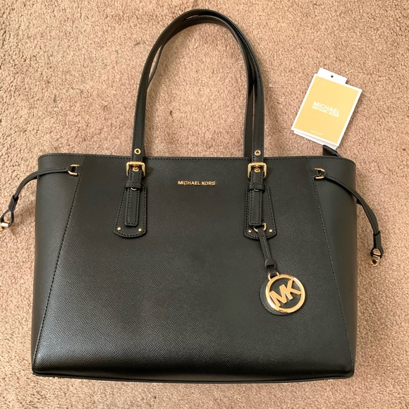Michael Kors Handbags - Michael kors medium black multifunction like new